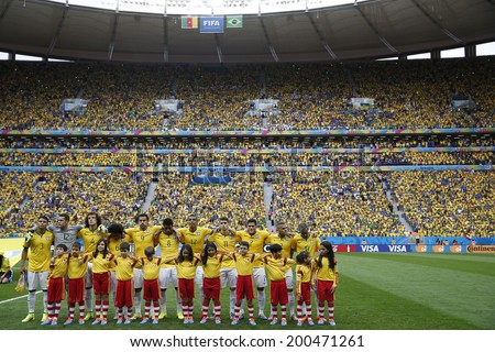 BRASILIA, BRAZIL - June 23, 2014: Brazil team during the National Anthem at the 2014 World Cup Group A game between Brazil and Cameroon at Estadio Nacional Mane Garrincha. No Use in Brazil.