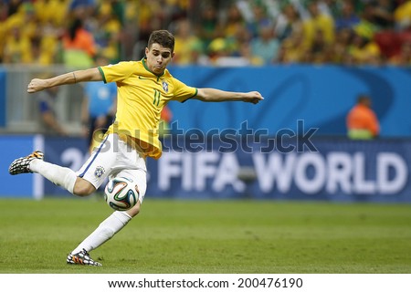 BRASILIA, BRAZIL - June 23, 2014: Oscar of Brazil during the 2014 World Cup Group A game between Brazil and Cameroon at Estadio Nacional Mane Garrincha. No Use in Brazil.