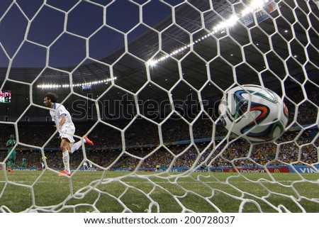 FORTALEZA, BRAZIL - JUNE 24, 2014: Samaras of Greece scores a goal during the World Cup Group C game between Greece and Ivory Coast at the Castelao stadium. NO USE IN BRAZIL.