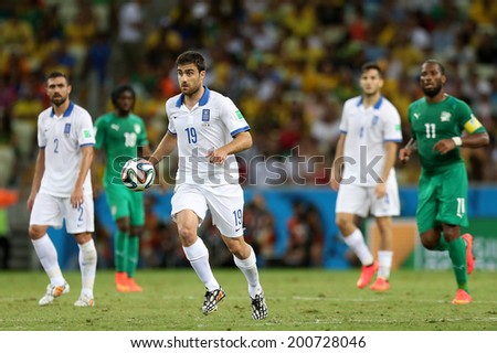 FORTALEZA, BRAZIL - JUNE 24, 2014: Papastathopoulos of Greece during the World Cup Group C game between Greece and Ivory Coast at the Castelao stadium. NO USE IN BRAZIL.