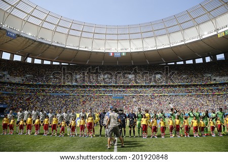 BRASILIA, BRAZIL - June 30, 2014: France and Nigeria team during National Anthem at the 2014 World Cup Round of 16 game between France and Nigeria at Estadio Nacional Mane Garrincha. No Use in Brazil.