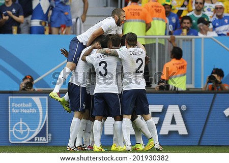 BRASILIA, BRAZIL - June 30, 2014: Benzema of France celebrates Pogba\'s goal during the World Cup Round of 16 game between France and Nigeria at Estadio Nacional Mane Garrincha. NO USE IN BRAZIL.