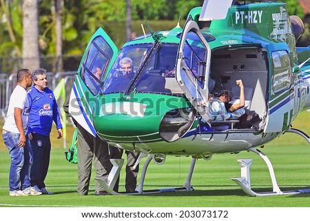 TERESOPOLIS, BRAZIL - JULY 05, 2014: Neymar leaves the Brazil National Team\'s center for treatment of his injuries suffered during the Brazil vs Colombia World Cup Quarter-finals game. NO USE IN BRAZIL.