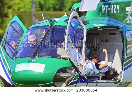 TERESOPOLIS, BRAZIL - JULY 05, 2014: Neymar leaves the Brazil National Team\'s center for treatment of his injuries suffered during the Brazil vs Colombia World Cup Quarter-finals game. NO USE IN BRAZIL.