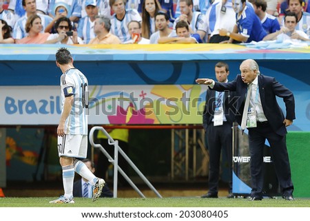 BRASILIA, BRAZIL - JULY 05, 2014: Messi and Sabella coach of Argentina during the World Cup Quarter-finals game between Argentina and Belgium in the Estadio Nacional. NO USE IN BRAZIL.