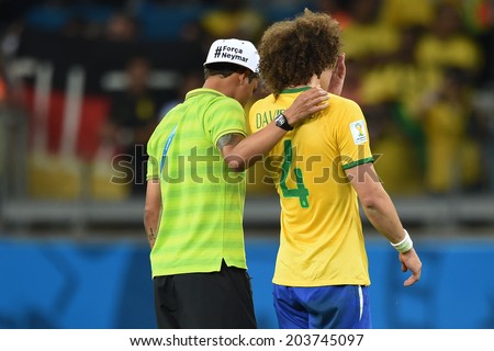 BELO HORIZONTE, BRAZIL - July 8, 2014: Thiago Silva (L) and David Luiz at the end of the World Cup Semi-finals game against Germany at Mineirao Stadium. NO USE IN BRAZIL.