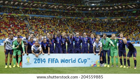 BRASILIA, BRAZIL - JULY 12, 2014: Team Netherlands posing for a photo after winning the World Cup Third place game between Brazil and the Netherlands in the Estadio Nacional. NO USE IN BRAZIL.