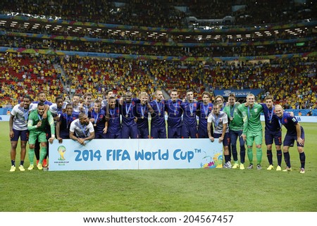 BRASILIA, BRAZIL - JULY 12, 2014: Team Netherlands pose for a photo after winning the World Cup Third place game between Brazil and the Netherlands in the Estadio Nacional. NO USE IN BRAZIL.