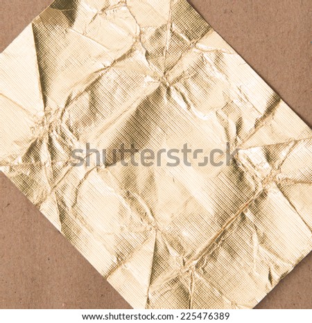 foil on brown paper