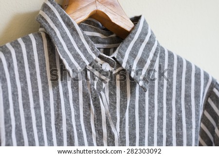 Hanging black and white linen shirt
