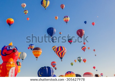 SAINT-JEAN-SUR-RICHELIEU, QUEBEC, CANADA - AUGUST 9, 2015 : 125 kinds of hot air balloons on Montgolfieres - The 8 Hot Air Balloons Festival Fleet in Saint-Jean-Sur-Richelieu, Canada on August 8, 2015