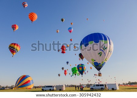 SAINT-JEAN-SUR-RICHELIEU, QUEBEC, CANADA - AUGUST 9, 2015 : 125 kinds of hot air balloons on Montgolfieres - The 8 Hot Air Balloons Festival Fleet in Saint-Jean-Sur-Richelieu, Canada on August 9, 2015