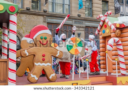 MONTREAL, QUEBEC, CANADA - NOVEMBER 21, 2015 : Ginger bread man platform in the 65th edition of the Santa Claus Parade Destination Centre-ville (Defile du Pere Noel) along Saint Catherine Street.