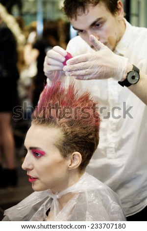 KIEV FASHION DAYS F/W 2014, Kiev, Ukraine - March 30, 2014: A Model Hair Dyeing Backstage.