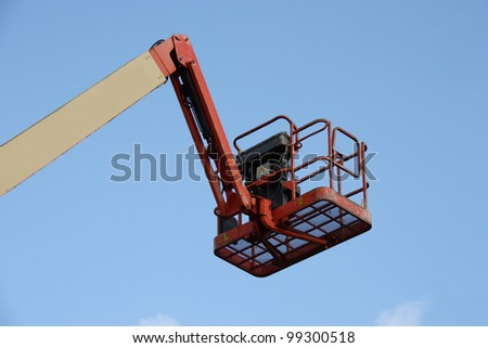 The Arm and Cage of a Cherry Picker Lift.