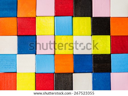 Colorful pixel background made of colored wooden bricks