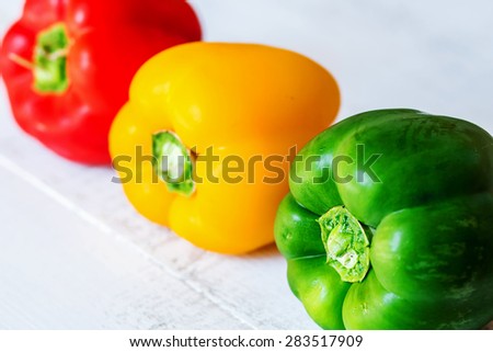 Three colorful sweet pepper - red, yellow and green