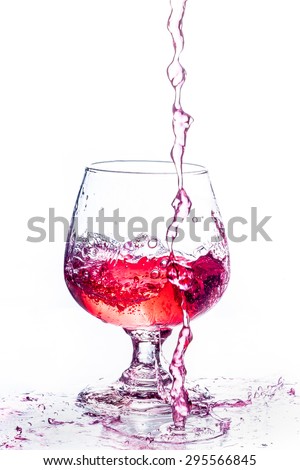 pouring sweet drink in wine glass