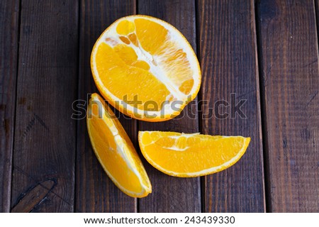 Fresh jucy orange in half and slices