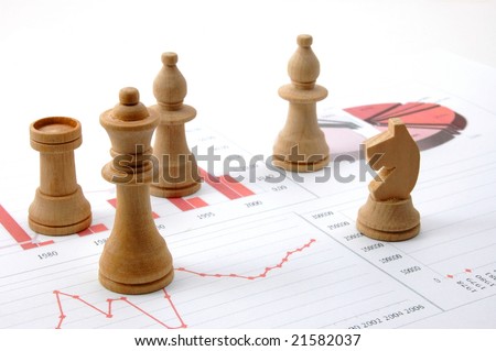 chess man over business chart admonish to strategic behavior
