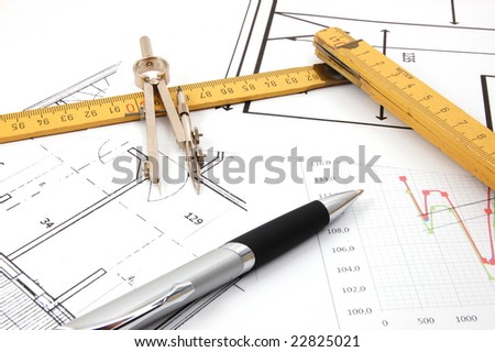 architecture or business still life with plans as background