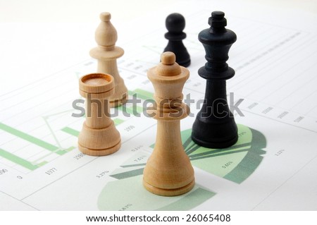 chess man over business chart admonish to strategic behavior
