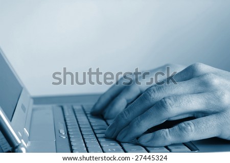 typing hands on keyboard writing business email
