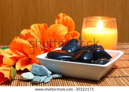 spa and wellness concept with flowers zen stones and towel