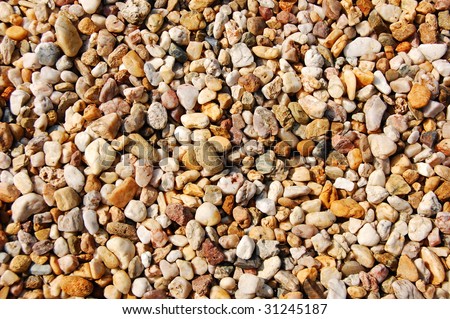 gravel texture at the beach as background