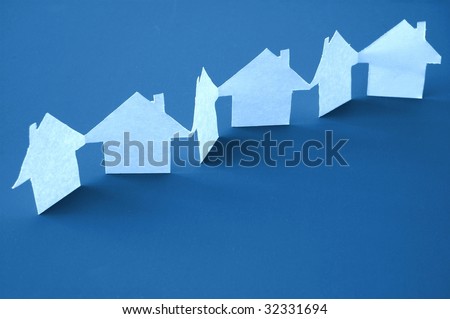 paper houses or homes showing a concept for real estate