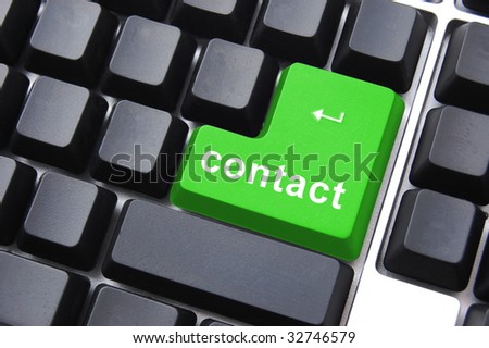 contact button on laptop showing computer support concept