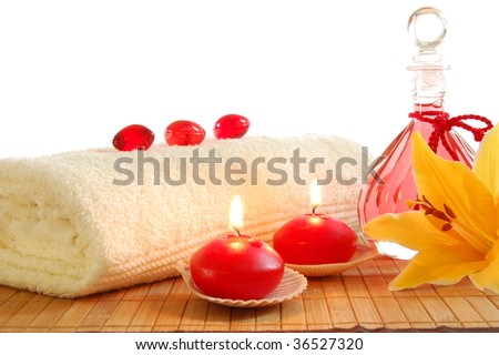 Spa Decoration With Candles And Red Bottle With Massage Oil Stock ...