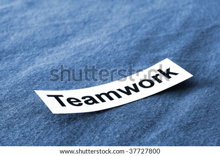 business teamwork concept shown by sheet paper with a word