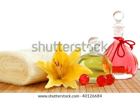 massage or spa concept with oil bottle isolated on white background