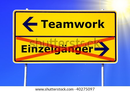 team or teamwork concept with a german sign