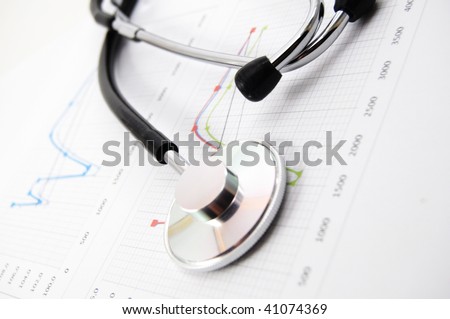 stethoscope on medical data chart in hospital
