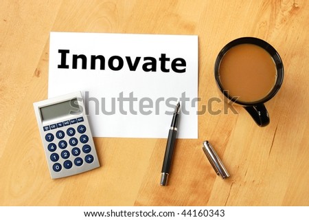 innovate or innovation business concept with coffee pen and paper in office