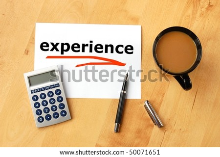 business experience concept with coffee pen and paper on desk in office
