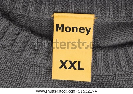 word money on xxl fashion label showing business success concept