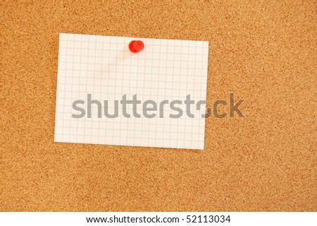blank and empty sheet paper with copyspace on bulletin board in office