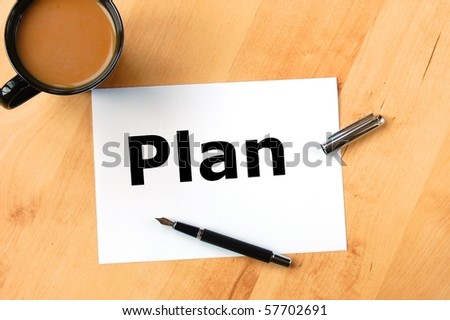 business plan or planning concept with pen paper and coffee