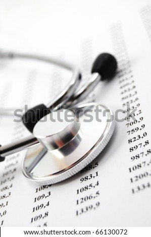 stethoscope on medical data showing medical or hospital concept