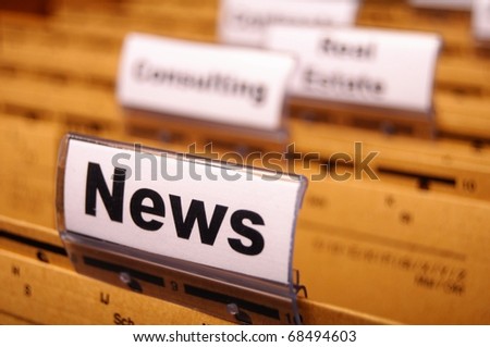 news or newsletter concept with word on folder register in business office