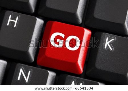 word go written on a red computer keyboard key or button
