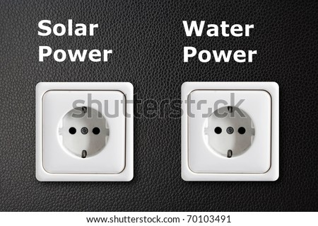two power outlets shonwing green or ecology energy concept