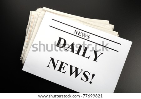 newspaper newsletter or news concept with pile of papers