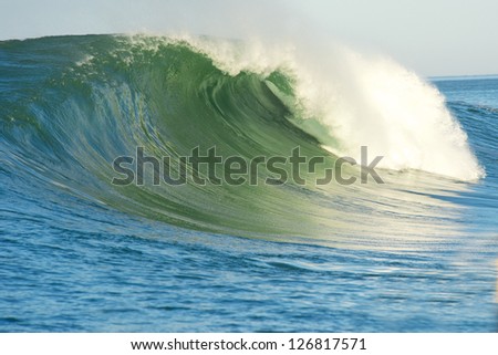 Huge surfing wave breaks during the Maverick Invitational surfing competition in Half Moon Bay, California