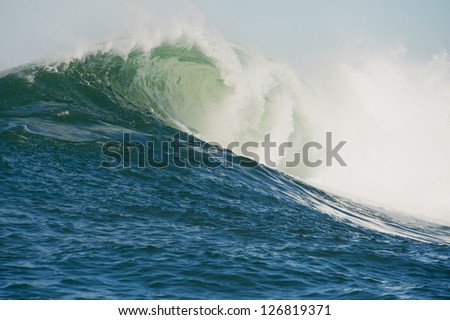 Huge wave breaks during the Maverick Invitational surfing competition at Half Moon Bay California