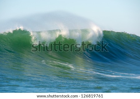 Huge wave breaks during the Maverick Invitational surfing competition at Half Moon Bay California