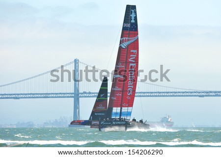 SAN FRANCISCO, CALIFORNIA Ã¢Â?Â? SEPTEMBER 14: Oracle Team USA and New Zealand sail at high speed during the finals race 8 at the AmericaÃ¢Â?Â?s Cup Finals on September 14, 2013 in San Francisco, California.